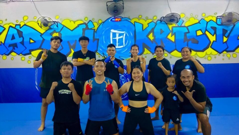 The team on the mat at Akademi Kristus